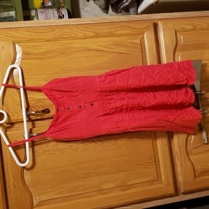 Adorable like new dress with adjustable straps. Elastic back as pictured